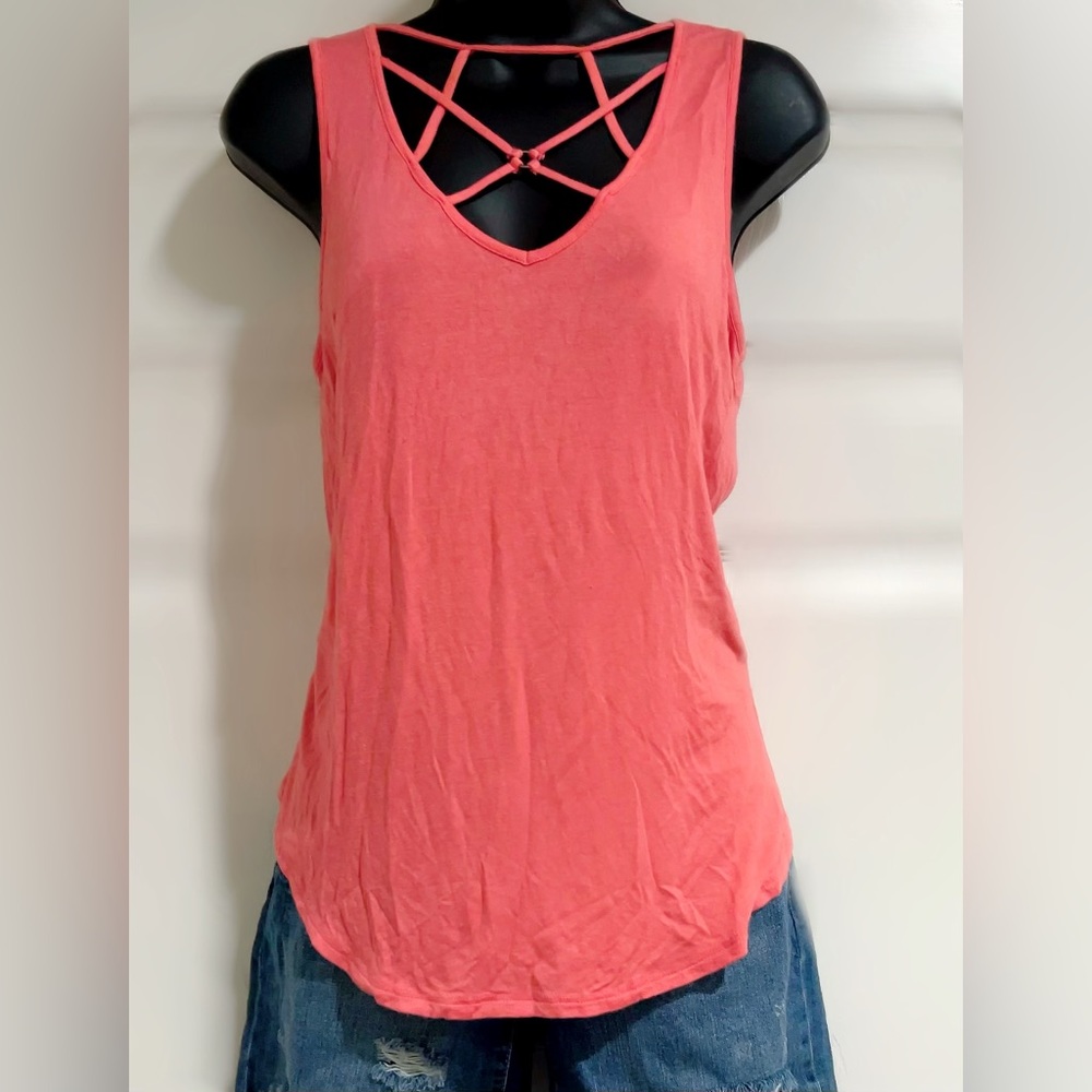 Women’s coral color sleeveless tank top with crisscross front.  Size S